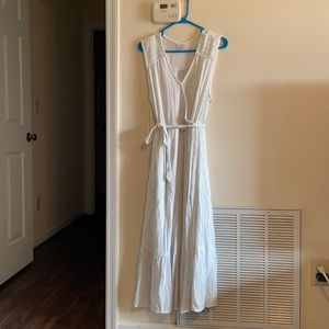 Long, flowy, white dress.